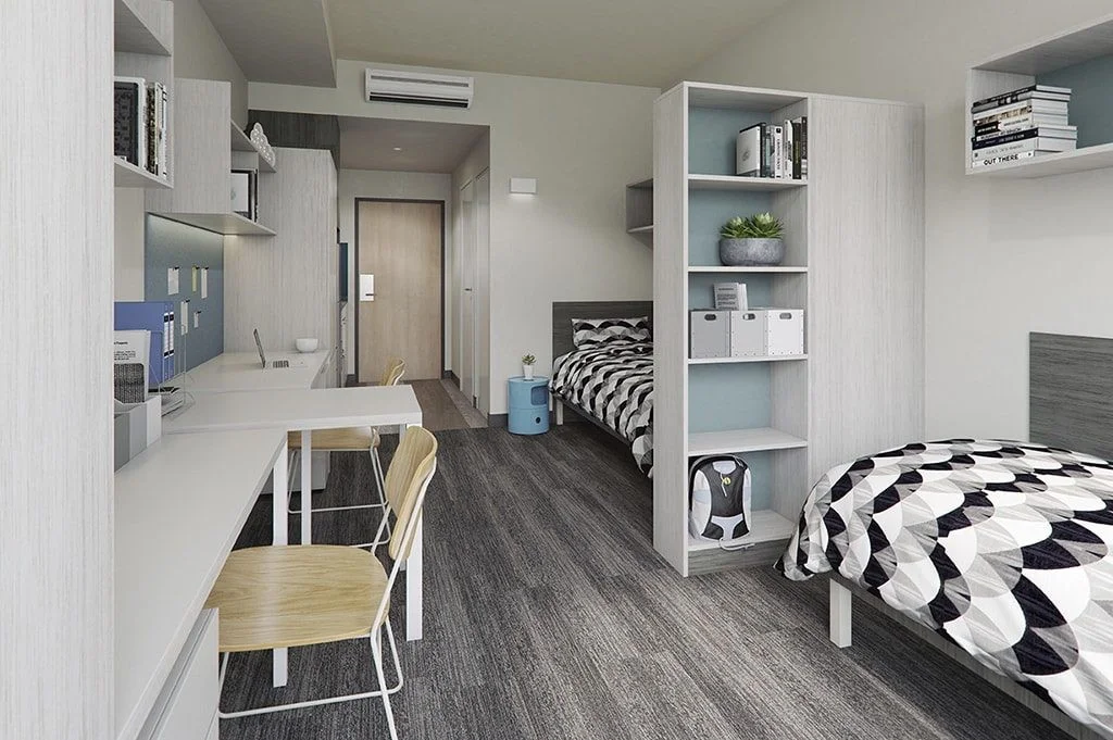 Shared student apartment interior in Australia with study desk and bed