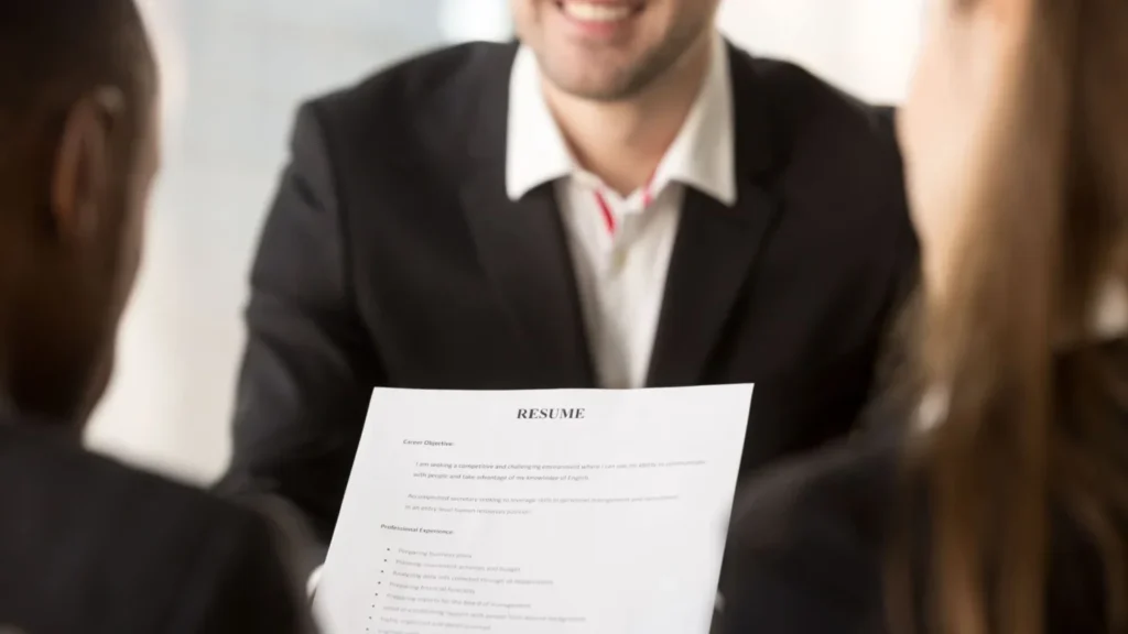 Student preparing a resume and documents for a part time job interview